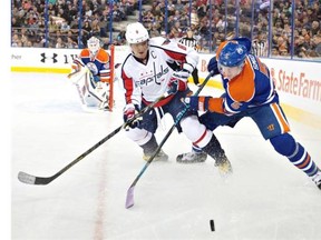 Oilers defenders like Ladi Smid had their hands full defending Hart Trophy winner Alex Ovechkin on Thursday. (Photograph by: JASON FRANSON, THE CANADIAN PRESS)