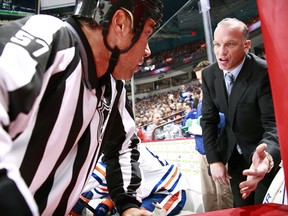 Edmonton Oilers assistant coach Kelly Buchberger, right.
