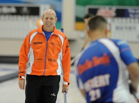 Kevin Martin slides down the ice during the final of The Shoot-Out bonspiel at the Saville Community Sports Centre on Sept. 15, 2013.