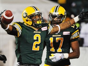 Edmonton Eskimos Fred Stamps celebrates his TD with Shamawd Chambers , right, against the Toronto Argonauts during CFL action at Commonwealth Stadium in Edmonton, Sept. 28, 2013.
Photograph by: Ed Kaiser , Edmonton Journal
