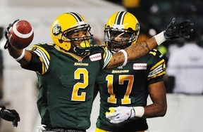 Edmonton Eskimos Fred Stamps celebrates his TD with Shamawd Chambers , right, against the Toronto Argonauts during CFL action at Commonwealth Stadium in Edmonton, Sept. 28, 2013.
Photograph by: Ed Kaiser , Edmonton Journal