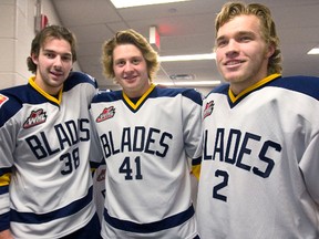 A trio of Saskatoon Blades model throwback jerseys the team wore Friday, Nov. 1, in their game against the Swift Current Broncos. The jerseys are being auctioned off for charity.