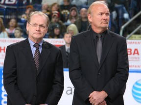 Darcy Regier, left, and Lindy Ruff.