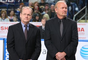 Darcy Regier, left, and Lindy Ruff.