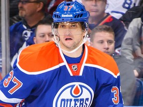 Edmonton Oilers defenceman Denis Grebeshkov in action against the Toronto Maple Leafs on Oct. 29, 2013.