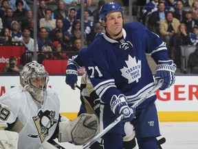 Pittsburgh Penguins goalie Marc-Andre Fleury tries to look past Toronto Maple Leafs forward David Clarkson during their game at Toronto's Air Canada Centre on Oct. 26, 2013, a 4-1 Leafs win. The teams meet again tonight in Pittsburgh.