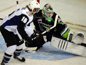 Swift Current Broncos centre Andrew Johnson skates in on Edmonton Oil Kings goalie Tristan Jarry during their WHL game on Saturday, Nov. 16, 2013 at Rexall Place. The Oil Kings won 4-2.