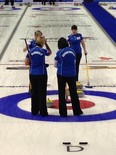 Grande Prairie's Renee Sonnenberg discusses a shot with teammates Lawnie MacDonald, Mary-Anne McTaggart and Rona Pasika during the Capital One Road to the Roar OIympic curling pre-trials at Kitchener, Ont., this week.