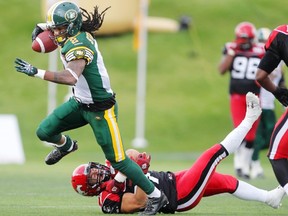 Edmonton Eskimos slotback Fred Stamps finds some running room against the Calgary Stampeders during a Canadian Football League game at McMahon Stadium in Calgary on Sept. 2, 2013.
Photograph by: Leah Hennel , Calgary Herald