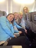 From left, Laura Crocker and her Saville Centre of rink of lead Jen Gates, second Rebecca Pattison and third Erin Carmody pose for a picture on the flight to Toronto earlier this week.