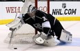 Los Angeles Kings goalie Martin Jones covers the puck during play against the Colorado Avalanche at L.A.’s Staples Center on Saturday, Dec. 21, 2013.