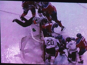 The action got hot and heavy between WHL rivals Portland Winterhawks and Edmonton Oil Kings Friday. On this key play nobody hustled harder than referee Derek Zalaski, who got in extraordinarily good position to correctly rule a no-goal call that survived a video review.