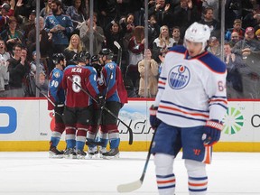 An all-too-familar scene as Nail Yaupov and the Oilers watch another opposition goal celebration.