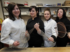 Female chefs (from left) Heather Dosman, Christine Sandford, Tracy Zizek, Danielle Majeau and Doreen Prei pose for a photo in the kitchen at the Petroleum Club in Edmonton Ab. on Friday Feb. 1, 2013. (photo by John Lucas/Edmonton Journal)