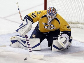 Former Edmonton Oilers goaltender Devan Dubnyk allowed five goals, including three quick ones in the first period, in his first game with the Nashville Predators on Jan. 18, 2014, at the Bridgestone Arena in Nashville. The Colorado Avalanche won the National Hockey League game 5-4.
