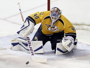 Former Edmonton Oilers goaltender Devan Dubnyk allowed five goals, including three quick ones in the first period, in his first game with the Nashville Predators on Jan. 18, 2014, at the Bridgestone Arena in Nashville. The Colorado Avalanche won the National Hockey League game 5-4.