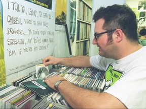 Former CJSR DJ Gabino Travassos in the station's music library in 1998. He was the host of one of 88.5 FM's most popular shows, The Great Western Ballroom. (Photo by Ed Parsons/Edmonton Journal.)