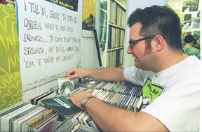 Former CJSR DJ Gabino Travassos in the station's music library in 1998. He was the host of one of 88.5 FM's most popular shows, The Great Western Ballroom. (Photo by Ed Parsons/Edmonton Journal.)