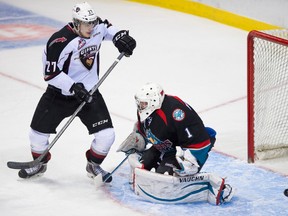 Vancouver Giants forward Jackson Houck watches the puck go past Kelowna Rockets goalie Jackson Whistle during WHL action at Vancouver's Pacific Coliseum on Friday, Jan. 3, 2014. Houck scored a hat-trick in the game, leading the Giants to a 4-2 victory, snapping the Rockets' 16-game win streak.