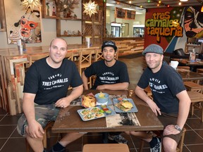 Restaurant owners (left to right) Daniel Braun, Edgar Gutierrez and Chris Sills (clockwise from left) at Taqueria Tres Carnales.