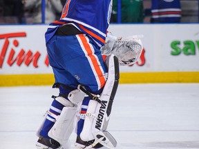 Ben Scrivens salutes/is saluted by the crowd at Rexall Place after one of the finest goaltending performances in NHL history, a 59-save shutout vs. San Jose Sharks on January 29.