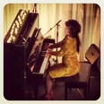 Megan James performing at the Art Gallery of Alberta's Refinery party.