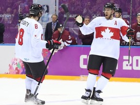 SOCHI: FEBRUARY 19, 2014 --Shea Weber (R) of Canada celebrates his goal with Drew Doughty against Latvia during third period in their quarterfinal match at the Sochi 2014 Olympic Games, February 19, 2014. Photo by Jean Levac/Postmedia News