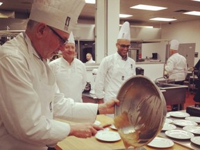 Hugh McPhail of the Edmonton Gentlemen's Dinner Club prepares dessert.