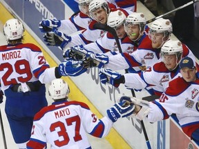 Edmonton Oil Kings' Mitchell Moroz celebrates with the bench after scoring against the Val-d'Or Foreurs during second period semifinal action at the Memorial Cup CHL hockey tournament, in London, Ont. on Friday, May 23, 2014. THE CANADIAN PRESS/Dave Chidley