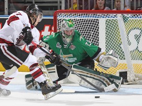 Keven Bouchard briefly saw action at the Memorial Cup, here stopping Tyler Bertuzzi of Guelph Storm.