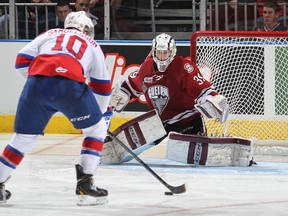 Henrik Samuelsson of the Edmonton Oil Kings moves in to score on Guelph Storm goaltender Justin Nichols during the Memorial Cup final at Budweiser Gardens in London, Ont., on May 25, 2014.