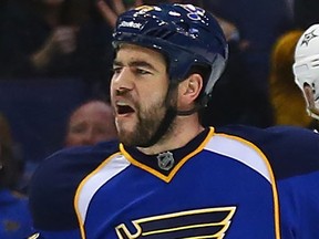 Roman Polak of the St. Louis Blues celebrates scoring a goal against the Dallas Stars at the Scottrade Center on March 11, 2014 in St. Louis.