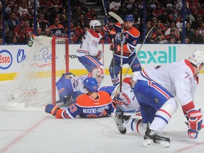 Taylor Hall and Ryan Nugent-Hopkins in action against Montreal Canadiens.