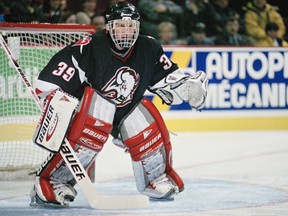 Dominik Hasek of the Buffalo Sabres follows the action circa 1996 at the Montreal Forum.