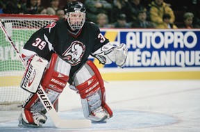 Dominik Hasek of the Buffalo Sabres follows the action circa 1996 at the Montreal Forum.