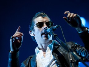 Alex Turner of the Arctic Monkeys poses as the band close out the second night of Sonic Boom 2014. Photo by: Mack  Lamoureux/Edmonton Journal.