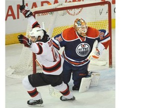 Adam Henrique celebrates the goal that put New Jersey Devils ahead to stay in their 2-0 win over the Edmonton Oilers Friday night.