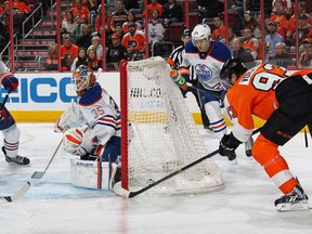 L-R Mark Fayne, Viktor Fasth and Oscar Klefbom watch from the other side of the net as Jakub Voracek tucks home the goal that put Oilers behind to stay, 4 minutes into the first period.