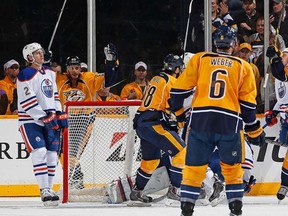 The expressions of Jeff Petry (left) and Niki Nikitin (right, partly obscured) say all you need to know about the first period of Tuesday's game. This lame goal by Filip Forsberg made it 3-0 and stood up as the winner.
