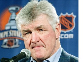 Toronto Maple Leafs head coach Pat Quinn addresses the media during a team practice at the Corel Centre in Ottawa Tuesday, April 13, 2004