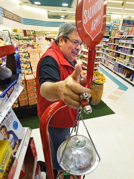 Denis Preece volunteers for the Salvation Army. The sound from these bells reminds him of his son Scott who was murdered about four years ago.