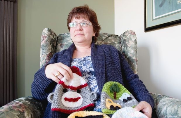 Mira Green, whose daughter Melinda was killed at an accident at an Edmonton Jeep show, crochets toques for kids in need.