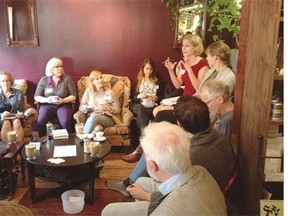 About two dozen people gathered to discuss Happy City at The Tea Girl in Edmonton on Sept. 3.