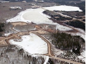 Aerial view of Primrose south leak site where bitumen was leaking into the small lake in the upper centre of the photo. A berm was constructed on the to separate the leaking fissure from the lake water. Photo taken on April 5, 2014.