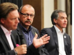 Alberta Conservative leadership candidates, from left, Thomas Lukaszuk, Ric McIver and Jim Prentice take part in the final leadership forum, sponsored by the Rotary Club of Calgary, on Friday at the Grey Eagle Casino.