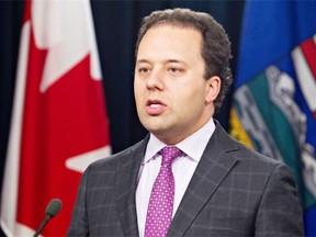 Alberta Justice Minister Jonathan Denis: Ottawa should kick in more funding. THE CANADIAN PRESS/Jason Franson