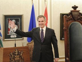 New Alberta Premier Jim Prentice is introduced during the swearing in ceremony for him and new cabinet ministers at Government House in Edmonton on Monday Sept. 15, 2014.