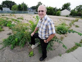 Allan Bolstad of the Edmonton Federation of Community Leagues stands at 76th Avenue and 96th Street. where a gas station used to exist. He believes neighbourhood agencies would turn such eyesores into assets.