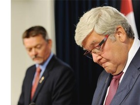 Apologizing to Albertan’s is Premier Dave Hancock as he and Minister of Finance Doug Horner responded to the recommendations in the Auditor General’s Special Duty Report on the Expenses of the Office of Premier Redford and Alberta’s Air Transportation Services Program at a news conference in the Legislature in Edmonton, August 19, 2014.