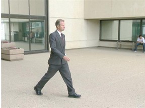 Arnold Donszelmann, former owner of Leisure RV Rentals near Millet, leaves the Edmonton Courthouse during a break during his July 2014 sentencing hearing for 31 counts of fraud over $5,000.